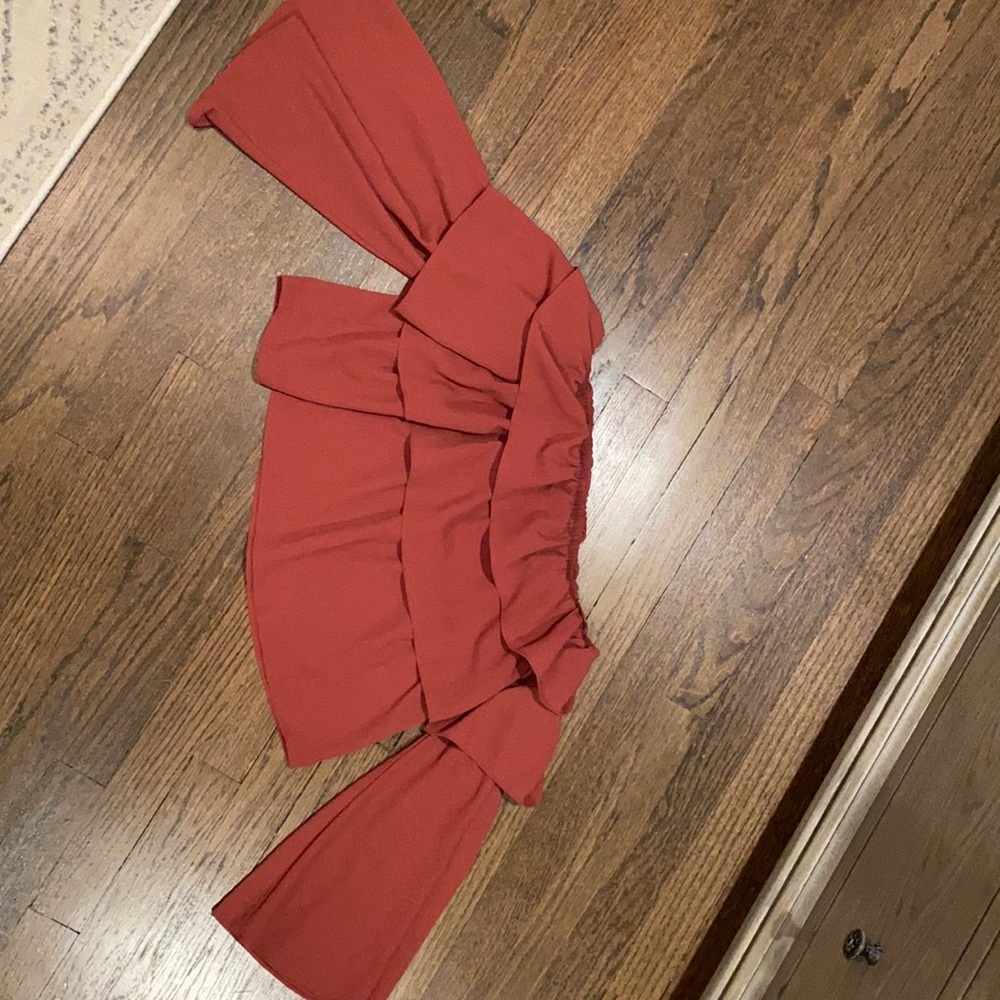 Off the shoulder burnt orange ruffle top